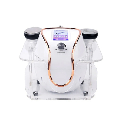Desktop cavitation and RF unit with three handle attachments on cradle stands